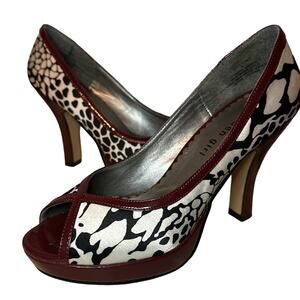 Madden Girl Platform Pumps. Black and white with red accent Zebra
